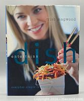 Front cover of Dish Entertains cookbook