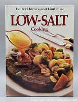 Front cover of the cookbook showing title and food image