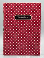 Front cover of red patterned hardcover