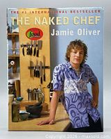 Front cover of The Naked Chef hardcover book
