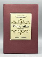 Front of burgundy slip-case with title label