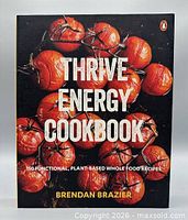 Front cover showing title, author and tomato imagery