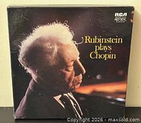 Front of box showing Rubinstein portrait and title