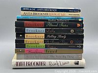 Stack of 11 Anita Brookner novels showing spines and titles
