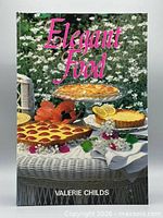 Front cover of Elegant Food hardcover cookbook