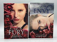 Front covers of Fury and Envy standing side by side