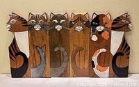 Front view flat showing six painted cat panels