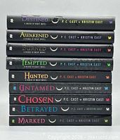 Stack of nine House of Night books showing spines and titles