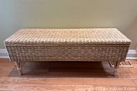 Front view of IKEA Tolkning wicker storage bench