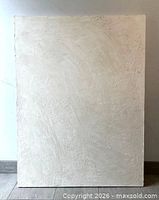 Front view of textured off-white canvas