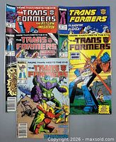Front covers of all five Transformers comics