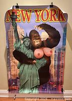 Full view of vertical poster on floor showing entire image and text