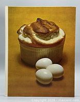 Front board showing soufflé image