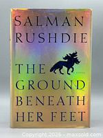 Front cover of holographic dust-jacketed book