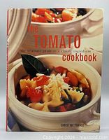 Front cover of The Tomato Cookbook showing title and imagery