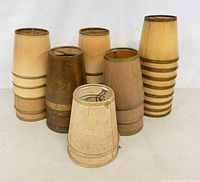 Front group view of assorted clip-on shades showing variety of colors and patterns