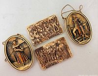 All four plaques front view