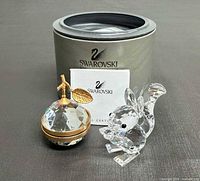 Squirrel figurine, apple paperweight, Swarovski box and certificate grouped