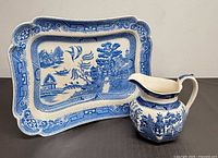 Platter and jug together showing size relation and pattern