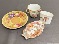 Group shot of all four porcelain items