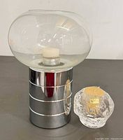 Both candle holders side by side showing scale and materials