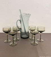 Pitcher, stirrer and six goblets group shot