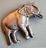 Front view of sterling silver elephant brooch