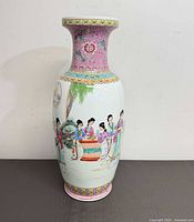 Full view front of porcelain vase with figural scene