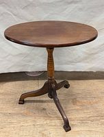 Full view of mahogany tilt-top pedestal table