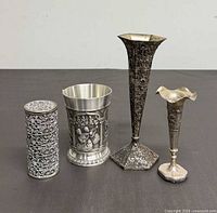 All four pewter items standing together for scale and overview
