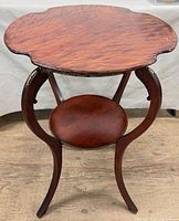 Full view of table showing top, lower shelf and legs