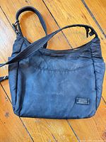 Black nylon crossbody bag front view