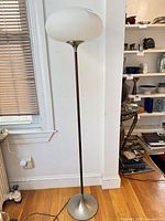 Full view of George Kovacs floor lamp showing base, pole and shade