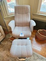 Front view of lounge chair and ottoman