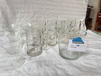 Assorted clear glassware grouped together