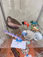 All nine items grouped in display case