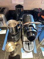 Top view showing Nespresso machine, Instant frother, milk pitcher