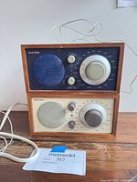 Front view stacked radios showing cream and navy faces