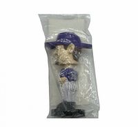 Sealed 3-inch Luis Gonzalez mini bobblehead in plastic bag, side view showing figure and cap