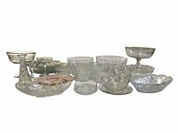 Full group of assorted clear and pink pressed glass serveware pieces