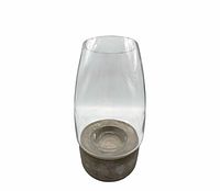 Candleholder assembled showing glass cylinder on cement base
