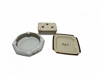 Three porcelain pieces arranged together