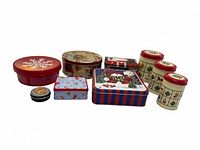 Full set of nine holiday tins arranged