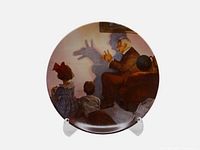 Front view of plate on stand showing full illustration