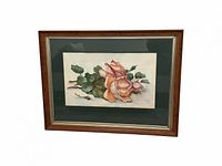 Front view of framed watercolor rose painting showing artwork, mat, glass and wood frame