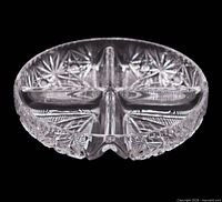 Oblique view of full round 4-part cut glass tray