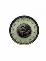 Front view showing Victorian scene, border and gilding