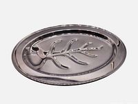Top view of W & S Blackinton silver-plate oval meat tray showing tree-well design