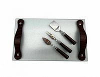 platter top view with three utensils laid on surface