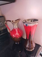 Pitcher and vase together showing shape and glaze